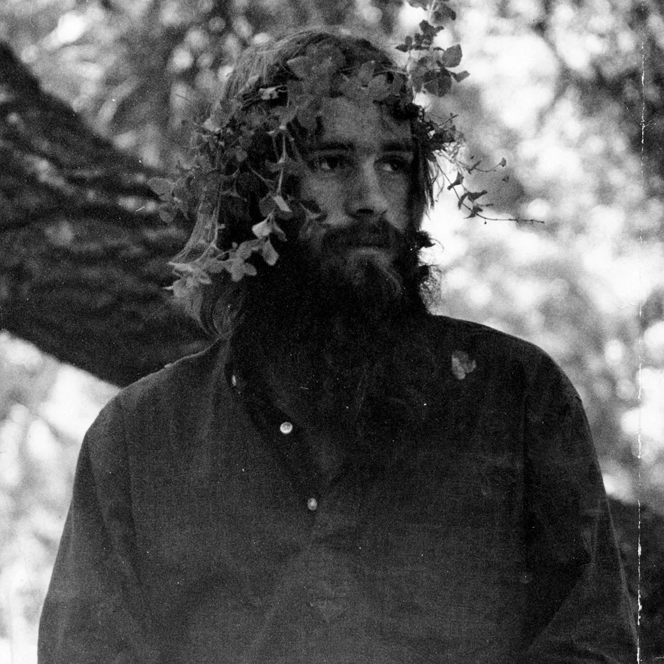 Amos Clifford, age 19, wearing a crown of Yerba Buena